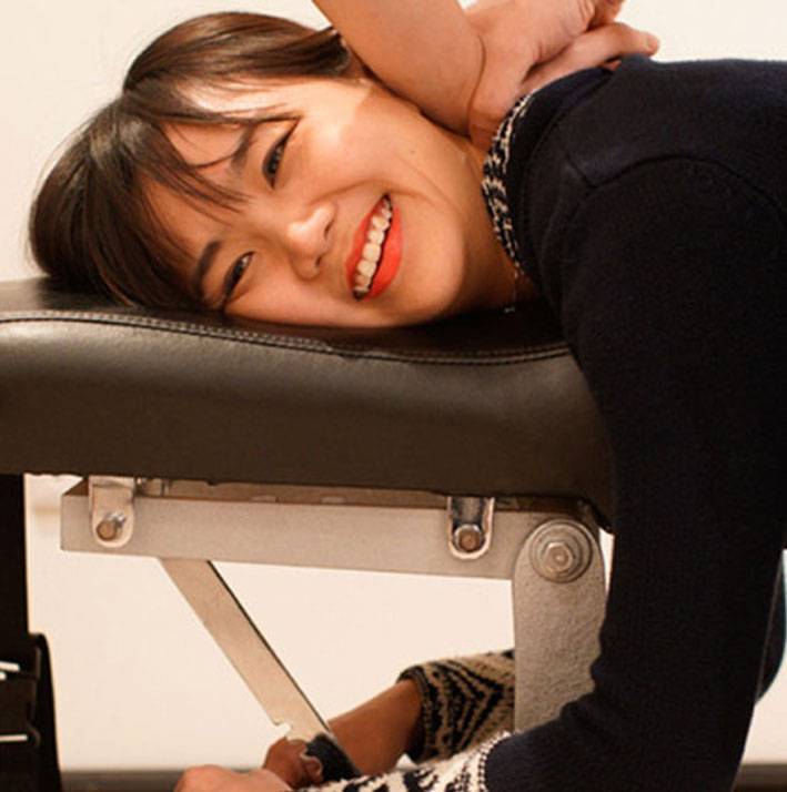 Neck chiropractic treatment on Singapore woman